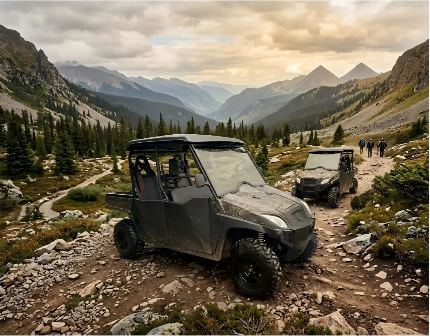 Electric UTV maneuvering through a steep, debris-strewn mountain path, demonstrating advanced drivetrain and all-terrain traction.