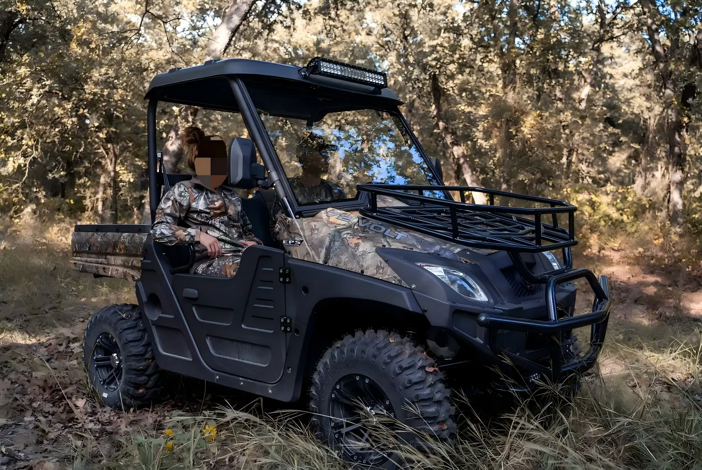 Custom 4x4 fuel UTV operating in a rugged outdoor farm environment