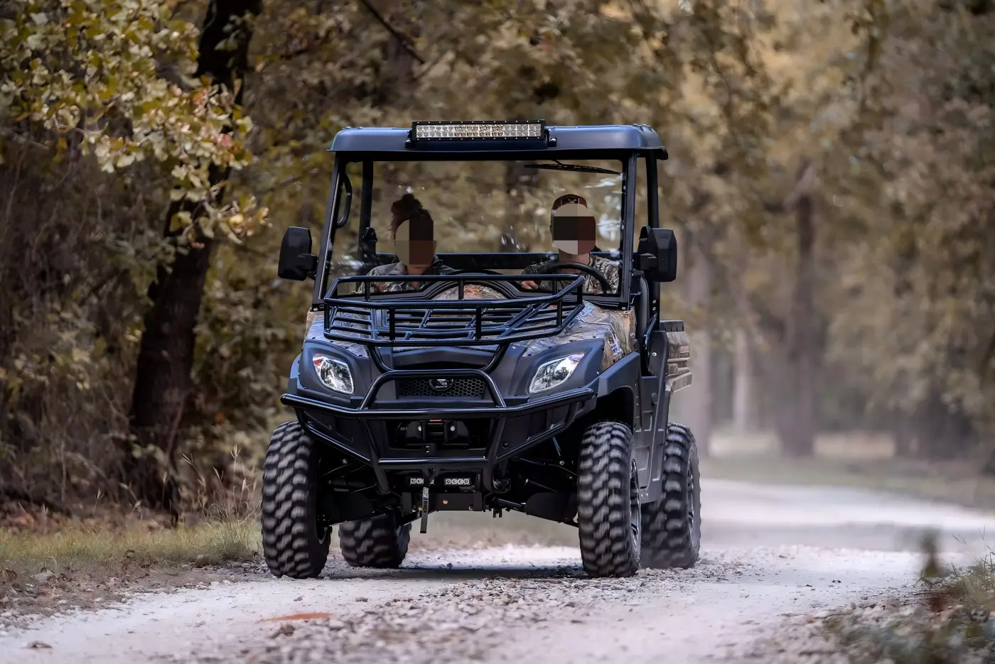 Fuel-powered UTV navigating complex terrain, highlighting all-terrain trafficability and high-speed driving stability.