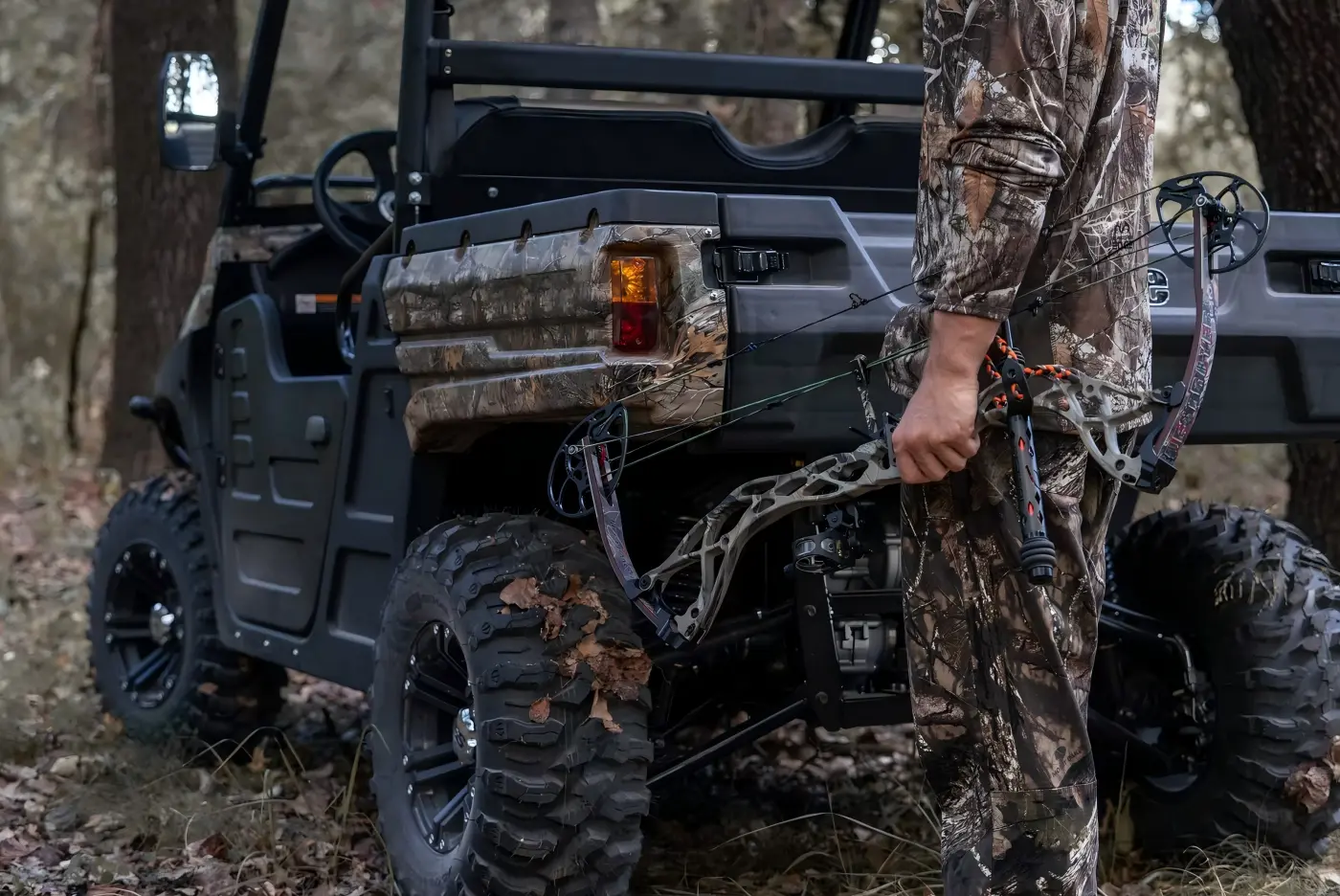 800cc Fuel UTV navigating through dense forest terrain