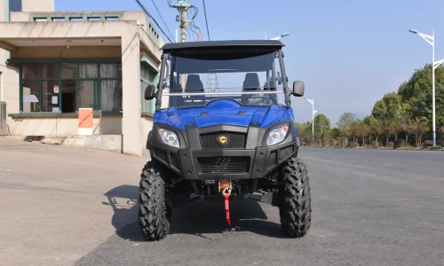 Blue crossover UTV with heavy-duty cargo bed and independent suspension