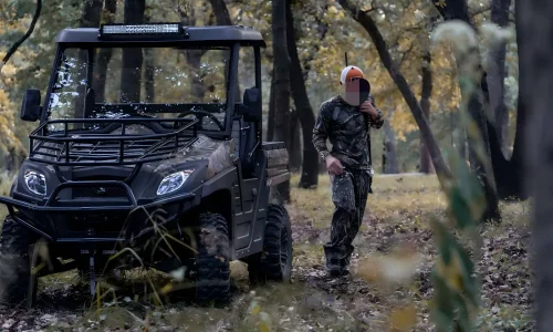 800cc gasoline UTV performing heavy-duty field work in rugged terrain