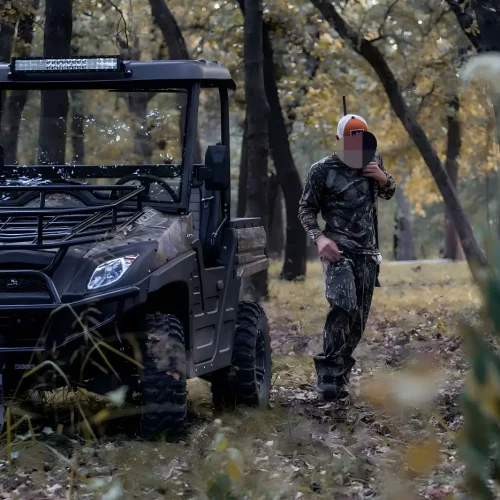 800cc gasoline UTV performing heavy-duty field work in rugged terrain