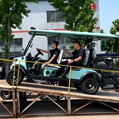 Electric golf cart climbing a steep ramp with a 7.5KW motor, showcasing off-road capability and hill-hold control features.